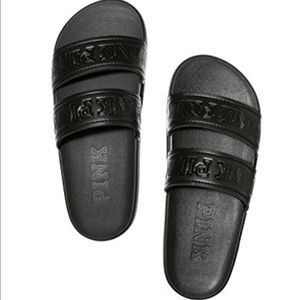 PINK double strapped slide sandals.